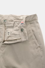 Close-up front view of Mason's Chino 'Torinostyle' grey pants showing zipper and waistband buttons, slim tapered fit, soft touch mix of modal, cotton and microfiber, french pockets, piped back pockets with button, and typical metal initial.