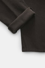 Close-up of Dondup Corduroy pants 'Spiritissimo' dark brown showing fine cord fabric and folded cuff from top-down perspective.

Description: Especially comfortable, velvety fine cord made of elastic cotton makes the 'Spiritissimo' by DONDUP a must-have f