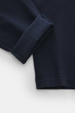 Nahaufnahme der Dondup Chino 'Ben' navy, Details von umgeschlagenem Bein aus Twill aus Baumwolle und Lyocell, weicher Griff, garment dyed, tapered Fit, knöchellang.