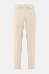 Front view of GTA Corduroy Pants 'Davide' sand in cotton corduroy with stretch quality, smooth touch, regular fit, slightly tapered, zipper and waistband button, internal elastic band, French pockets, small logo detail, back pockets with button.