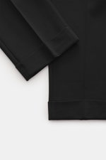 GTA Jersey-Hose 'Dennis' schwarz, Detailaufnahme Saum und Bein, Jersey aus Viskose/Microfaser, elastisch, glatter Griff, Tapered Fit, knöchellang, Bundknopf, Reißverschluss.