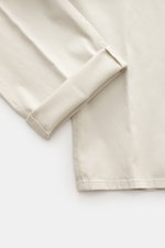 GTA Chino 'Herrick' cream fabric detail shown from top-down perspective, elastic cotton, soft touch, regular fit, low waist height.