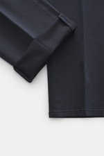 Close-up front view of the GTA Chino 'Herrick' navy pants showing elastic cotton fabric with soft touch, regular fit, low rise, zipper and waistband button, elastic insert in waistband, side adjuster, double waistband pleat, French pockets, and back pocke