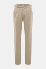 Front view of GTA Chino 'Herrick' beige pants made of elastic cotton with soft touch, regular fit, low rise, zipper and waistband button, elastic insert in the waistband, side adjuster, double waistband pleat, French pockets, and back pockets with button.