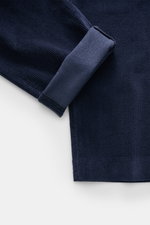 Close-up of the hem and cuff of Closed Corduroy Pants 'Clifton' navy, showing soft cotton corduroy texture, photographed from above.

Description: With the casual 'Clifton' pants made of soft cotton corduroy from the trouser experts CLOSED, you are very w