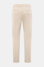 Rear view of 04651/ A trip in a bag Corduroy pants sand in wide cotton corduroy with seersucker inside, featuring regular fit, tapered legs, waistband button, zipper, partially elastic waistband, side seam pockets, double waistband pleat, welt back pocket