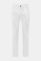 Front view of 04651/ A trip in a bag Corduroy pants white, made of soft wide cotton corduroy with seersucker inside, regular fit, tapered legs, zipper, button, elastic waistband, side and welt back pockets, double waistband pleat, and fixed hem cuff.