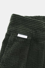 Close-up front view of 04651/ A trip in a bag Corduroy pants dark green waistband in wide soft cotton corduroy with seersucker inside.