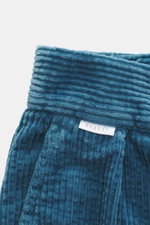 Close-up top view of 04651/ A trip in a bag Corduroy pants smoky blue made from soft wide cotton corduroy with seersucker back.