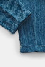 Close-up front view of 04651/ A trip in a bag Corduroy pants smoky blue made from wide cotton corduroy with seersucker back.