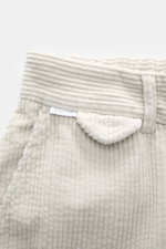 Close-up front view of 04651/ A trip in a bag Corduroy Pants taupe showing soft wide cotton corduroy, waistband, button, and belt loop.