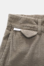 Close-up front view of 04651/ A trip in a bag Corduroy Pants taupe in soft wide cotton corduroy with seersucker back, waistband, and button.