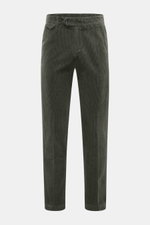 Front view of 04651/ A trip in a bag Corduroy Pants dark green made from soft wide cotton corduroy with seersucker inside, tapered fit, ankle length, zip and button, elastic waistband, French and back pockets with flaps.