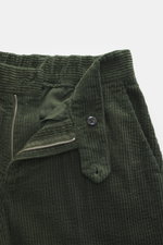 Close-up front view of 04651/ A trip in a bag Corduroy Pants dark green made from soft wide cotton corduroy with seersucker inside.
