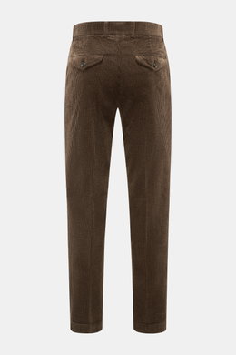 Rear view of 04651/ A trip in a bag Corduroy Pants Dark Brown, made from wide soft cotton corduroy with seersucker inside, tapered fit, ankle length, buttoned flap back pockets, and partially elastic waistband.