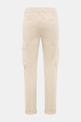 Rear view of 04651/ A trip in a bag Cord Cargo Pants Dark Brown in pure cotton corduroy, tapered fit, ankle-length with cargo and piped back pockets, elastic waistband, and fixed hem cuff, showcasing modern design and highest wearing comfort.