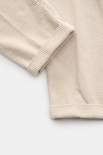 Close-up front view of 04651/ A trip in a bag Cord Cargo Pants Dark Brown made of pure cotton corduroy, showing soft feel, tapered fit, ankle-length cuff, and detailed stitching. Modern design, highest wearing comfort: the cargo pants in a casual cut by 0