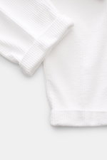 Close-up of 04651/ A trip in a bag Cord Cargo Pants White cuff and fabric texture, showing pure cotton corduroy with soft feel from top view.