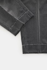 Brunello Cucinelli Corduroy Pants Dark Grey shown in close-up from above, highlighting pure cotton fabric, double pleats, and stitching.
