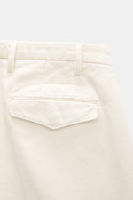 Close-up rear view of Michael Coal Cotton Pants cream, twill made of cotton with soft touch, tapered fit, regular thigh width, ankle length, narrowing, zipper and waistband hook, extended button tab, French pockets, and back pockets with flap.