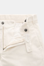 Michael Coal Cotton trousers cream shown from the front close-up with zipper and waistband button open, twill made of cotton, stretch quality, soft touch, regular fit, very tapered, extended button tab, French pockets, and piped back pockets.