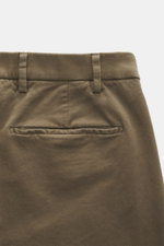 Michael Coal Cotton trousers olive shown from back close-up, twill cotton, stretch, soft touch, regular fit, very tapered, zipper, waistband button, extended tab, French and piped back pockets.