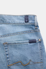 7 for all mankind Jeans 'Slimmy' rauchblau close-up rear view showing subtle used wash, stitching, back pockets, and logo labels on cotton blend denim. <p>Mit sieben Jeans kommt der Mensch gut durchs Leben – so die Philosophie des Denim-Labels 7 FOR ALL M