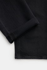 Stone Island Jeans 'Stretch Black Denim - Rinsed' schwarz, Slim Fit, sehr schmal zulaufend, Detailansicht Bein mit Umschlag, Baumwolle, elastisch, Kompass-Badge.
