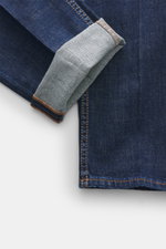 Close-up front-side view of Jacob Cohen Jeans 'Jude' dark blue cuff showing slightly elastic cotton denim, grippy texture, contrasting seams.

Description: <p>With JACOB COHEN, you are always right when it comes to modern luxury in everyday life: The prem