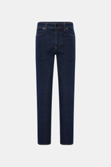 Stone Island Jeans 'Stretch Indigo Denim - Rinsed' dark blue slim fit jeans shown front view, cotton denim with elastic quality, very tapered, compass badge on waistband. Urban classic in a modern silhouette, part of STONE ISLAND's 'Denim' capsule collect