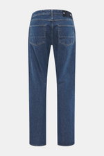 Stone Island Jeans 'Indigo Denim - Medium Grainy Wash' dark blue shown from the back, straight fit, pure cotton denim with subtle used wash, five-pocket style, button fly, compass badge on waistband, material-typical texture.