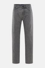 Front view of Stone Island Jeans 'Black Denim - Light Grey Wash' grey, straight fit denim made of pure cotton with subtle used wash, button fly, five-pocket style, and compass badge on waistband, showing typical material texture and straight cut. Denim wi