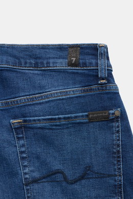 7 for all mankind Jeans 'Slimmy' dunkelblau, Rückansicht mit Weblabel, Five-Pocket Stil, Slim Fit, Baumwolle mit Stretch, Used-Waschung, Zip Fly, leicht schmal zulaufend.
