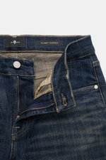 7 for all mankind Jeans 'Slimmy Tapered' graublau, Nahaufnahme von offenem Zip Fly, Five-Pocket-Stil, authentische Used-Waschung, Baumwoll-Denim mit Stretch, Slim Fit, Weblabel am Bund.
