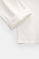 Offwhite PT Torino Denim Jeans 'Barrel' shown close-up from above, highlighting denim made of pure cotton, soft touch, tapered fit, straight cut, ankle length, button fly, and rear logo patch.