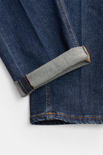 PT Torino Denim Jeans 'Indie' graublau im Slim Fit, Detailfoto in Seitenperspektive mit umgeschlagenem Saum aus robustem, leicht elastischem Denim.