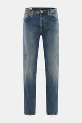 Front view of Incotex Jeans smoky blue made of elastic cotton with slightly grippy texture, authentic wash, slim fit, slightly tapered legs, five-pocket style, button fly, and leather patch.