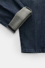 Incotex Jeans navy im Raw Design, Detailaufnahme von unten mit aufgeschlagenem Bein, Denim aus Baumwolle, leicht schmal zulaufend, Regular Fit.