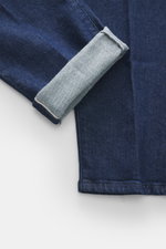 Incotex Jeans navy aus Baumwolle mit leichtem Stretch, Raw Design, Tapered Fit, Indigo gefärbt, Detailaufnahme Umschlag, griffige Qualität.
