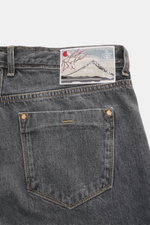 Close-up rear view of Ace Denim Jeans 'AD 53' dark grey showcasing the embroidered patch, selvedge denim made of cotton, light stretch, soft touch, tapered fit, very slim tapering, button fly, and five-pocket style.