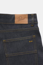 Close-up rear view of Percival Jeans 'Straight Leg' dark blue showing denim made from pure cotton with typical material structure, grippy quality, tapered fit, regular thigh width, ankle length, straight cut, zip fly, and five-pocket style.