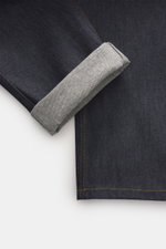 Percival Jeans 'Straight Leg' dark blue shown from a top-down close-up of the ankle area with cuff rolled, denim made from pure cotton, typical material structure, grippy quality, tapered fit, regular thigh width, ankle length, straight cut, zip fly, five