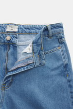 Close-up front view of Percival Light Blue Jeans made from pure cotton denim with typical material texture, grippy quality, zip fly, five-pocket style, tapered fit, regular thigh width, ankle length, and straight cut.