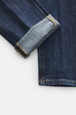 Dondup Jeans 'George' dunkelblau, Detailansicht umgekrempeltes Bein, elastischer Denim, authentische Waschung, Skinny Fit, weicher Griff, sichtbare Naht.