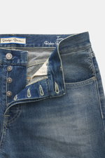 Dondup Jeans 'Icon Relax' smokey blue shown from the front top close-up, featuring selvedge denim made of pure cotton, slightly textured feel, authentic used wash, modern distressed effects, Icon Relax Fit (Tapered Fit), regular thigh width, ankle length,