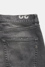 Close-up rear view of Dondup Jeans 'Icon Relax' grey showing pure cotton fabric with slightly textured feel, authentic used wash, modern distressed effects, Icon Fit slim style, narrow-cut thigh, tapered fit, short cut, button fly, and five-pocket style.