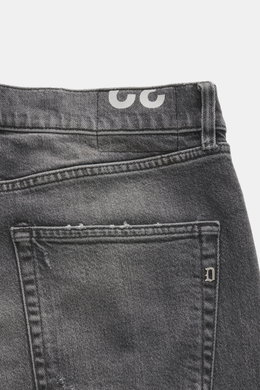 Close-up rear view of Dondup Jeans 'Icon Relax' grey showing pure cotton fabric with slightly textured feel, authentic used wash, modern distressed effects, Icon Fit slim style, narrow-cut thigh, tapered fit, short cut, button fly, and five-pocket style.