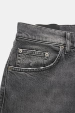 Close-up front-side view of Dondup Jeans 'Icon Relax' grey, showcasing pure cotton fabric with slightly textured feel, authentic used wash, modern distressed effects, Icon Fit (slim fit), narrow-cut thigh, tapered fit, short cut, button fly, and five-pock