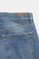 Back view close-up of Dondup Jeans 'Bray' smoky blue showing denim made of elastic cotton, soft feel, authentic wash, regular fit, button fly, five-pocket style, and small metal initial.