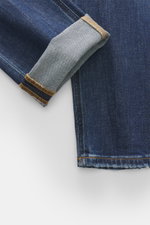 Close-up front view of Dondup Jeans 'George' dark blue folded cuff showing stretch cotton texture and authentic wash.

Description: <p>Comfortable denim: The 'George' jeans from DONDUP made of stretch cotton can be combined in many ways for casual office 